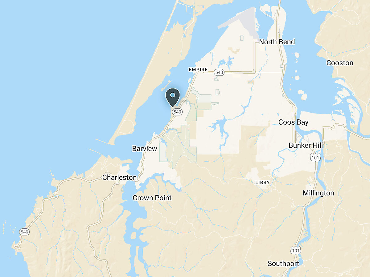 A map showing areas in Oregon, including Coos Bay, North Bend, and surrounding regions with rivers and coastal markings.